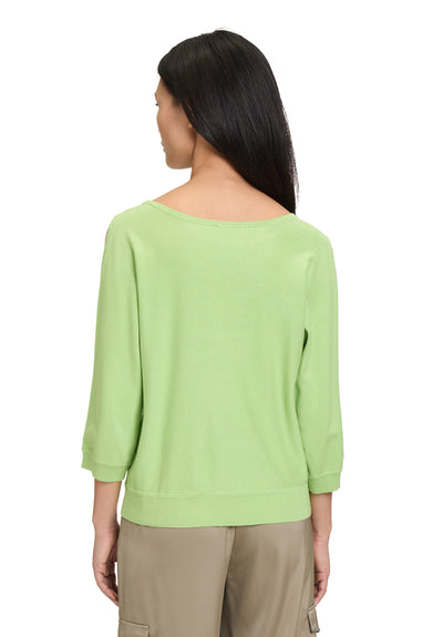 Green Jumper with Gold Embelishment and Cold Shoulder Effect