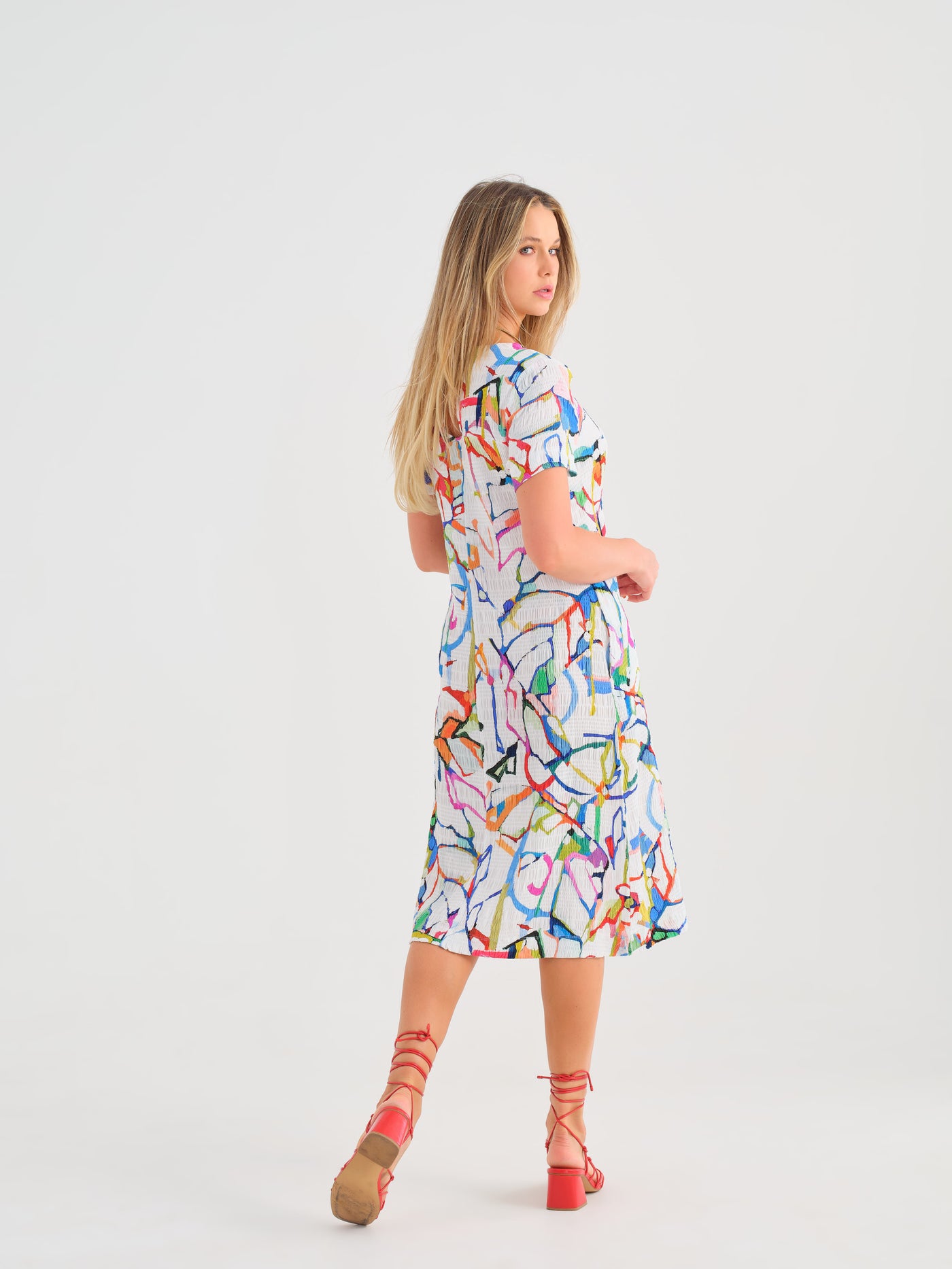 Abstract Print Dress with V-Neck and Pockets